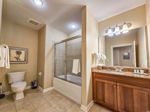 full bath featuring visible vents, toilet, vanity, shower / bath combination with glass door, and tile patterned floors