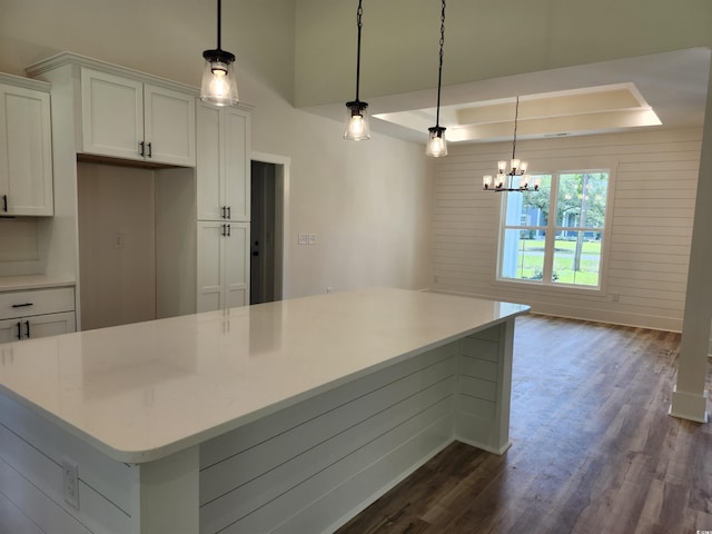 974 Crooked Oak Dr, Pawleys Island, SC 29585 - kitchen with dark wood-style floors, white cabinetry, a chandelier, and light countertops