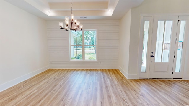 974 Crooked Oak Dr, Pawleys Island, SC 29585 - entrance foyer with a raised ceiling, a chandelier, and wood finished floors