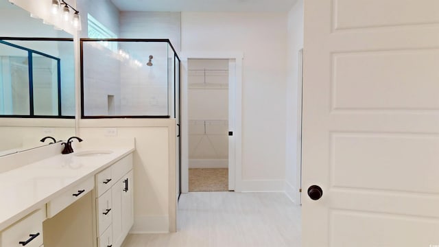 974 Crooked Oak Dr, Pawleys Island, SC 29585 - full bath featuring vanity, a shower stall, and a spacious closet