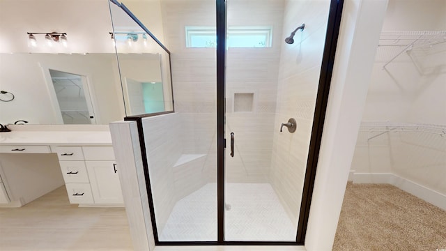 974 Crooked Oak Dr, Pawleys Island, SC 29585 - full bath featuring vanity, a shower stall, and a walk in closet