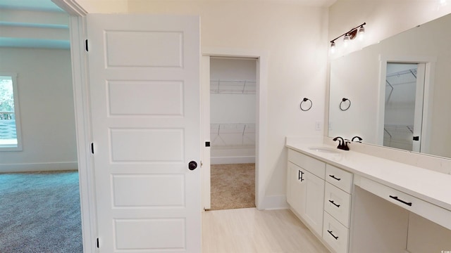 974 Crooked Oak Dr, Pawleys Island, SC 29585 - full bathroom featuring vanity and a walk in closet