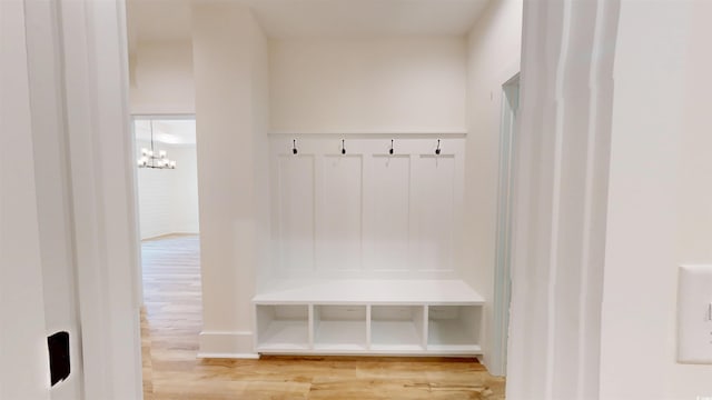 974 Crooked Oak Dr, Pawleys Island, SC 29585 - mudroom with wood finished floors and a chandelier