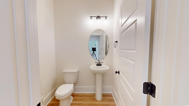 974 Crooked Oak Dr, Pawleys Island, SC 29585 - bathroom featuring toilet and wood finished floors