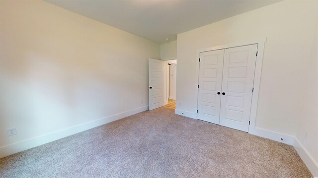 974 Crooked Oak Dr, Pawleys Island, SC 29585 - unfurnished bedroom with carpet flooring and a closet