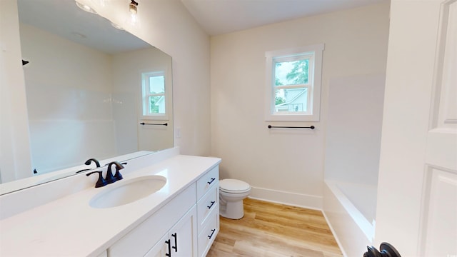 974 Crooked Oak Dr, Pawleys Island, SC 29585 - bathroom with healthy amount of natural light, vanity, and wood finished floors