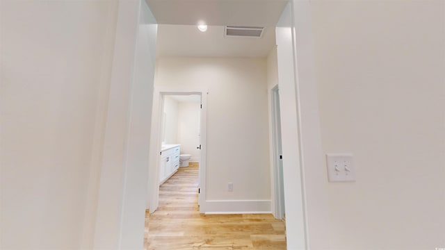 974 Crooked Oak Dr, Pawleys Island, SC 29585 - hallway with light wood finished floors and baseboards