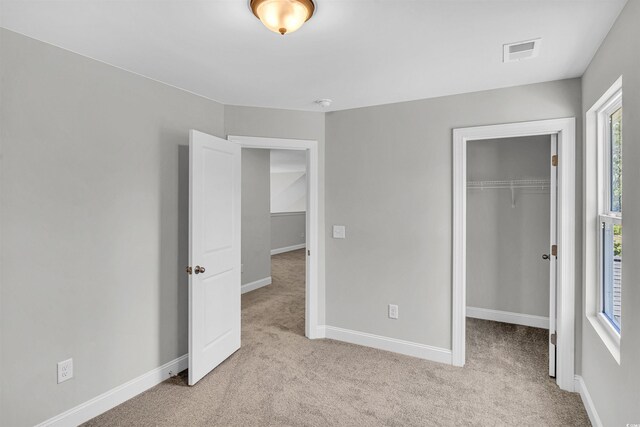 1105 NW Forest Bend Dr, Calabash, NC 28467 - bathroom featuring visible vents, a sink, toilet, double vanity, and tile patterned floors