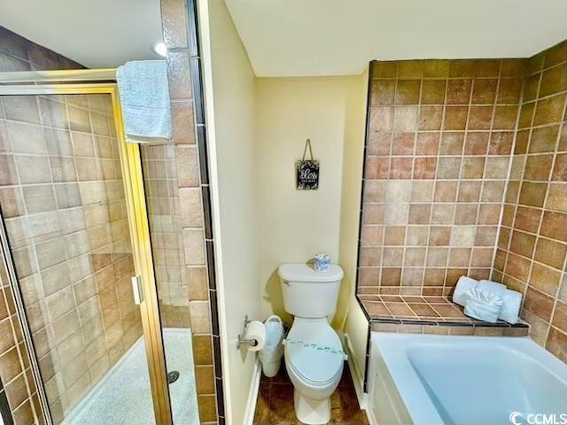 full bathroom with a bath, tile patterned floors, toilet, baseboards, and a shower stall