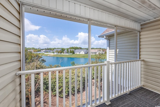 117 Butkus Dr Unit 5, Myrtle Beach, SC 29588 - unfurnished sunroom with a water view and a residential view