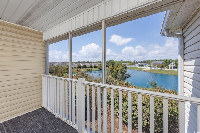 117 Butkus Dr Unit 5, Myrtle Beach, SC 29588 - unfurnished sunroom with a water view and a residential view
