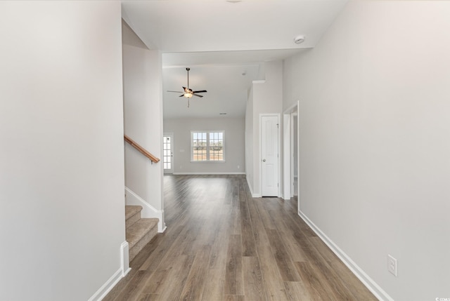 364 Hayloft Cir, Conway, SC 29526 - hall with lofted ceiling, stairway, and wood finished floors