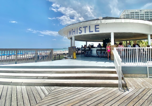 deck featuring a water view