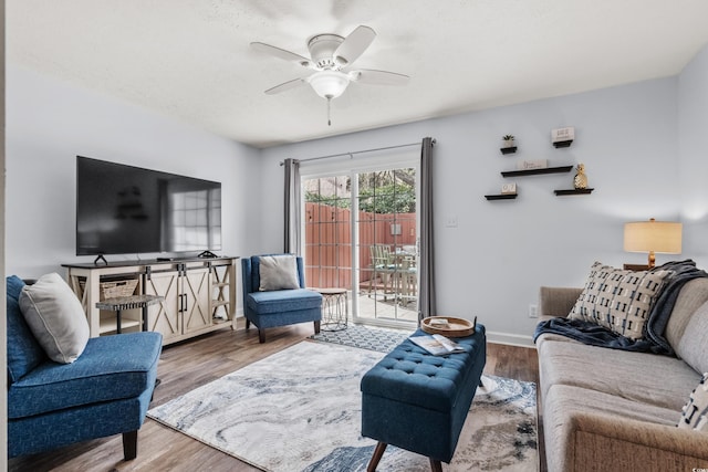 5508 Porcher Dr Unit 3, Myrtle Beach, SC 29577 - living area featuring wood finished floors, a ceiling fan, and baseboards