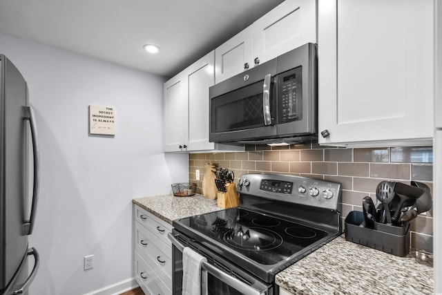 5508 Porcher Dr Unit 3, Myrtle Beach, SC 29577 - kitchen with appliances with stainless steel finishes, white cabinetry, tasteful backsplash, and recessed lighting