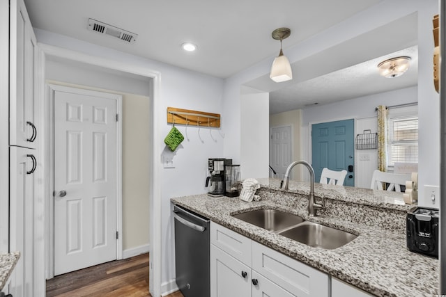 5508 Porcher Dr Unit 3, Myrtle Beach, SC 29577 - kitchen with a sink, stainless steel dishwasher, white cabinetry, dark wood-style floors, and decorative light fixtures