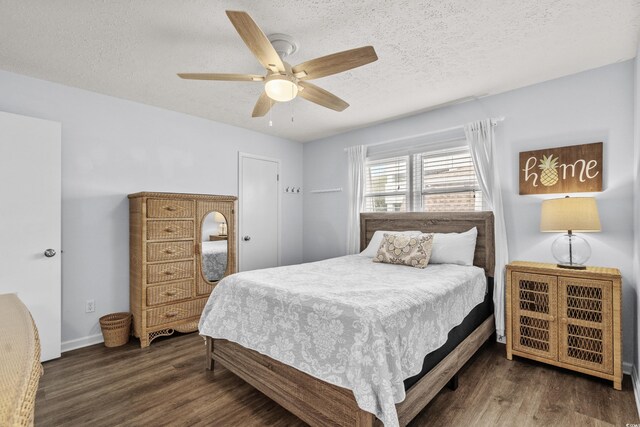 5508 Porcher Dr Unit 3, Myrtle Beach, SC 29577 - bedroom with wood finished floors, ceiling fan, baseboards, and a textured ceiling