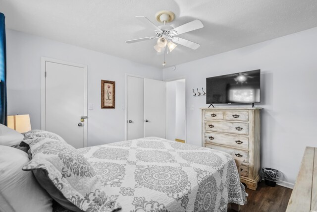 5508 Porcher Dr Unit 3, Myrtle Beach, SC 29577 - bedroom with dark wood finished floors, ceiling fan, and baseboards