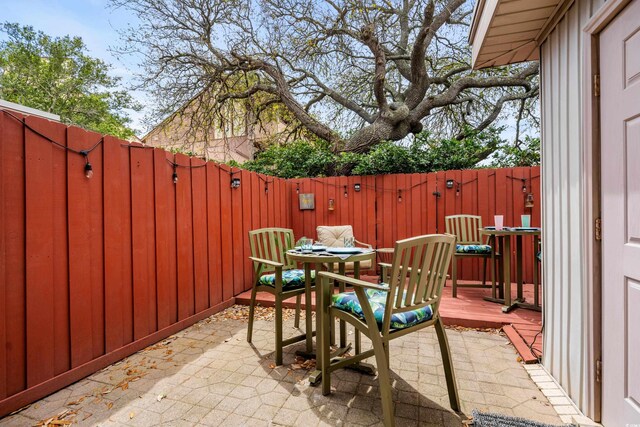 5508 Porcher Dr Unit 3, Myrtle Beach, SC 29577 - view of patio with a fenced backyard and a deck