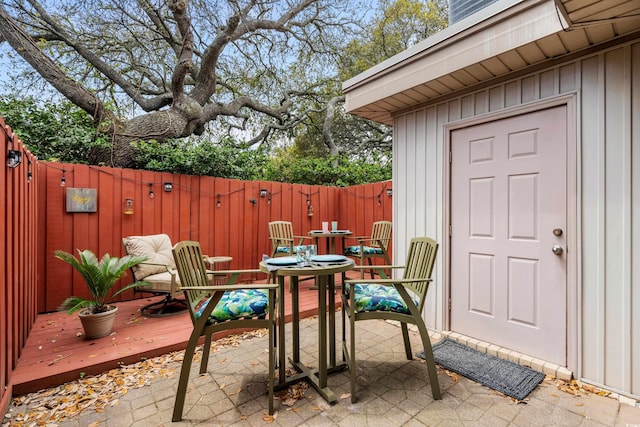5508 Porcher Dr Unit 3, Myrtle Beach, SC 29577 - view of patio featuring a fenced backyard and a wooden deck