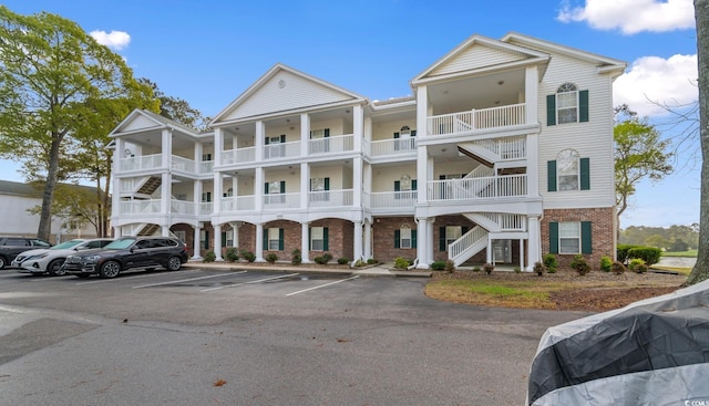 4400 Turtle Ln Unit 3-A, Little River, SC 29566 - view of building exterior featuring uncovered parking