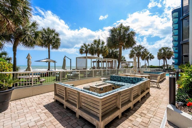 2701 N Ocean Blvd Unit 1154-60, Myrtle Beach, SC 29577 - view of patio / terrace featuring a pool and a water view