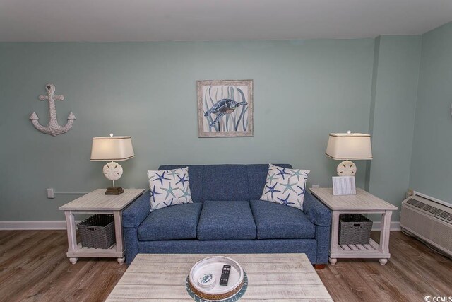2001 S Ocean Blvd Unit 207, Myrtle Beach, SC 29577 - living room featuring baseboards and wood finished floors