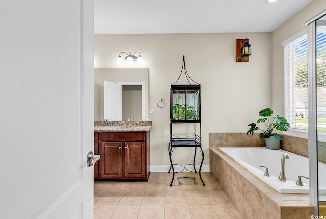 522 Heartland Ct, Murrells Inlet, SC 29576 - full bathroom with tile patterned floors, vanity, plenty of natural light, and a garden tub