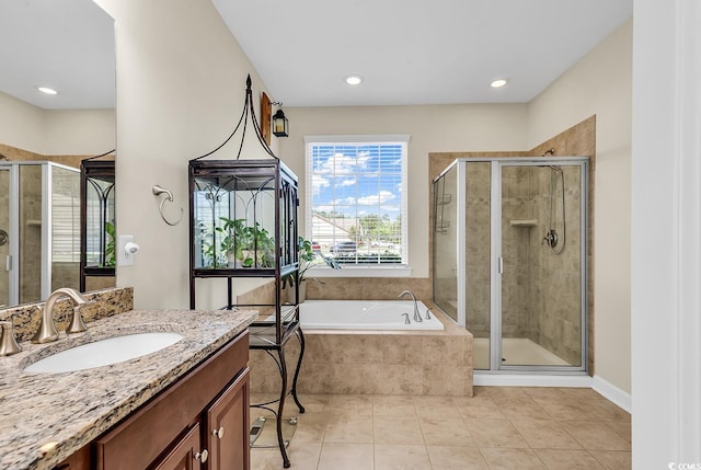 522 Heartland Ct, Murrells Inlet, SC 29576 - bathroom with a stall shower, a garden tub, and vanity