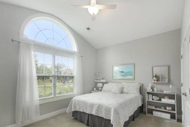 1406 Seabrook Plantation Way N, Myrtle Beach, SC 29582 - bedroom featuring light colored carpet, vaulted ceiling, multiple windows, baseboards, and ceiling fan