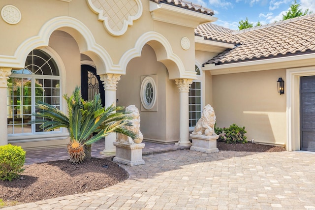 1563 Cadiz Dr, Myrtle Beach, SC 29579 - doorway to property with stucco siding and a tiled roof