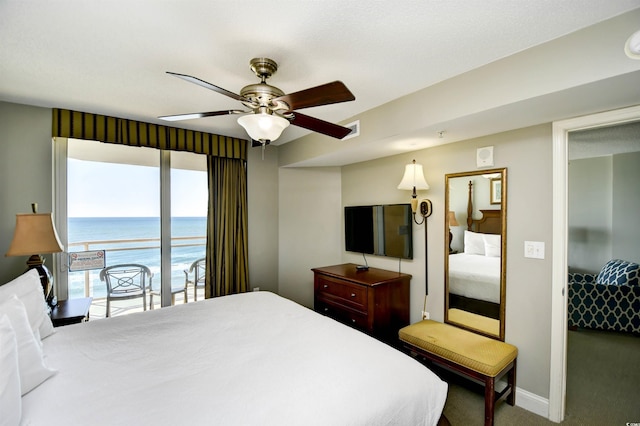 carpeted bedroom with visible vents, ceiling fan, and baseboards
