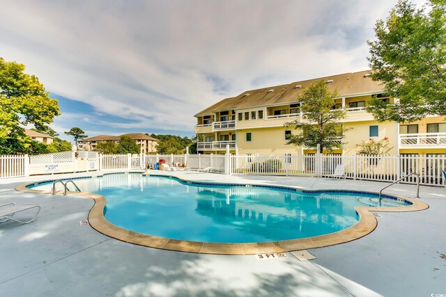 1100 Possum Trot Rd Unit G-216, North Myrtle Beach, SC 29582 - community pool featuring a patio