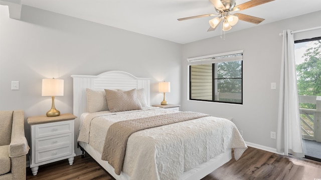 1100 Possum Trot Rd Unit G-216, North Myrtle Beach, SC 29582 - bedroom featuring access to exterior, dark wood-style floors, multiple windows, and a ceiling fan