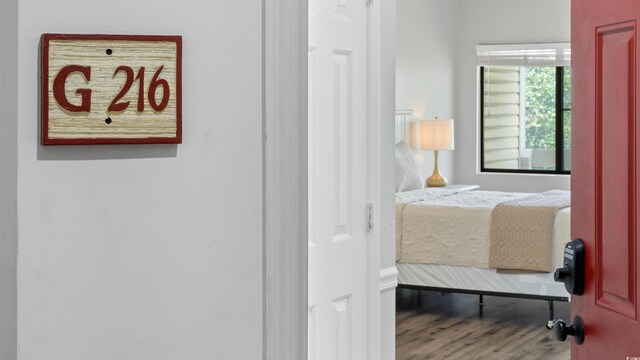 1100 Possum Trot Rd Unit G-216, North Myrtle Beach, SC 29582 - bedroom featuring wood finished floors
