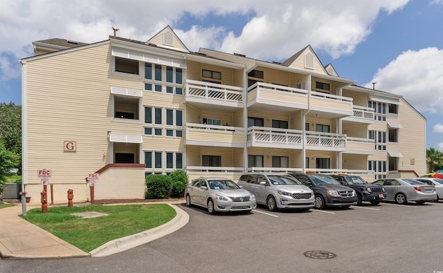1100 Possum Trot Rd Unit G-216, North Myrtle Beach, SC 29582 - view of apartment building / complex with uncovered parking