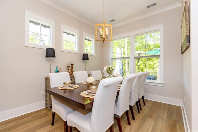 402 Bumble Cir, Murrells Inlet, SC 29576 - dining area featuring plenty of natural light, visible vents, ornamental molding, and a chandelier
