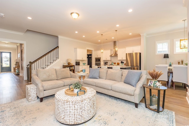 402 Bumble Cir, Murrells Inlet, SC 29576 - living area featuring plenty of natural light, recessed lighting, light wood finished floors, and crown molding