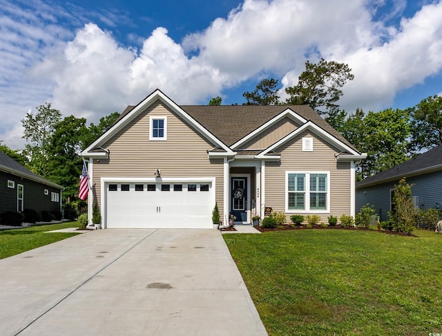402 Bumble Cir, Murrells Inlet, SC 29576 - craftsman-style home with driveway, a front lawn, and a garage