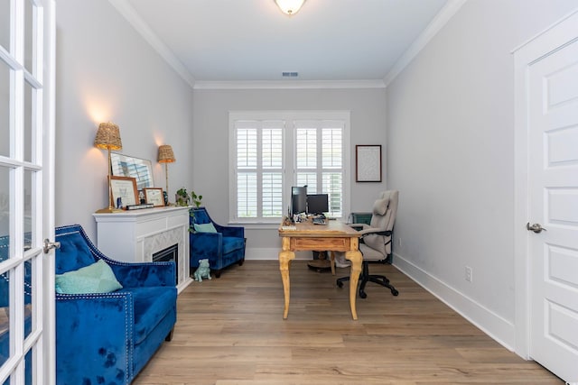402 Bumble Cir, Murrells Inlet, SC 29576 - office space featuring baseboards, ornamental molding, light wood-style flooring, and a fireplace