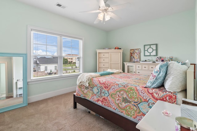 712 Crystal Water Way, Myrtle Beach, SC 29579 - carpeted bedroom with multiple windows and ceiling fan