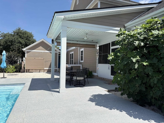 712 Crystal Water Way, Myrtle Beach, SC 29579 - view of patio / terrace featuring an outdoor pool, outdoor dining area, and a storage unit