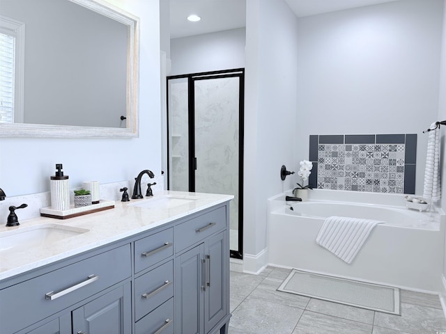 712 Crystal Water Way, Myrtle Beach, SC 29579 - bathroom featuring a garden tub, double vanity, and a stall shower