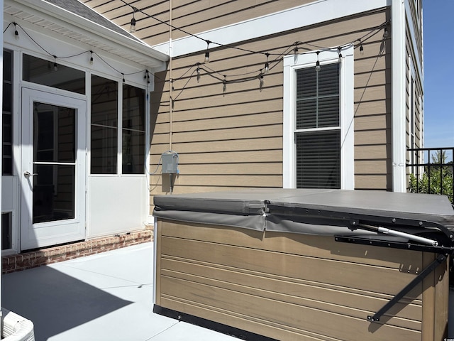 712 Crystal Water Way, Myrtle Beach, SC 29579 - view of patio featuring a hot tub and a sunroom