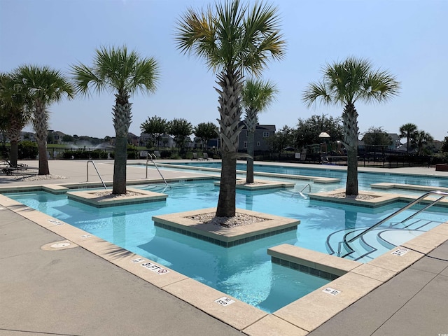 712 Crystal Water Way, Myrtle Beach, SC 29579 - community pool with a hot tub