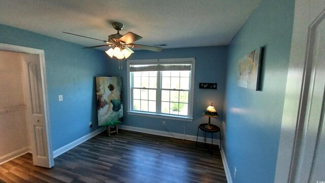 1210 Horry Rd, Aynor, SC 29511 - empty room with baseboards, dark wood finished floors, a ceiling fan, and a textured ceiling