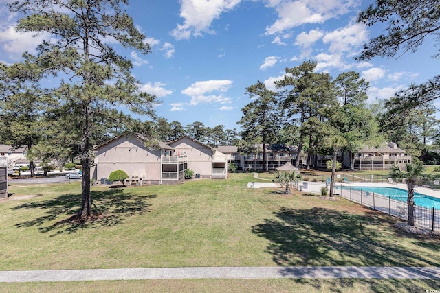 3015 Old Bryan Dr Unit 10-7, Myrtle Beach, SC 29577 - view of yard featuring a fenced in pool and fence