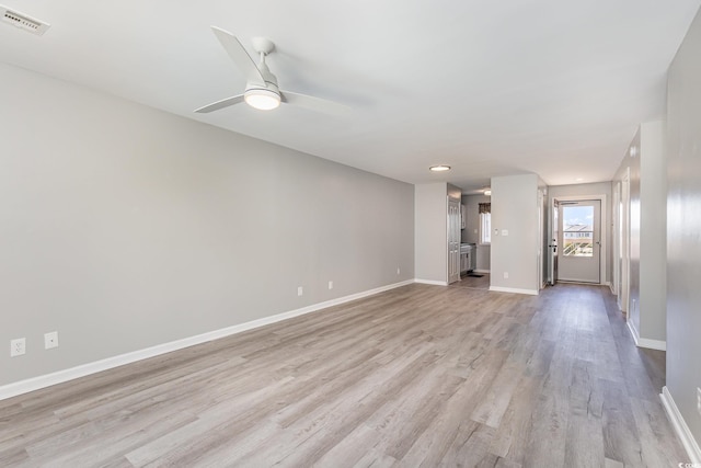 3015 Old Bryan Dr Unit 10-7, Myrtle Beach, SC 29577 - unfurnished living room with light wood finished floors, baseboards, a ceiling fan, and visible vents