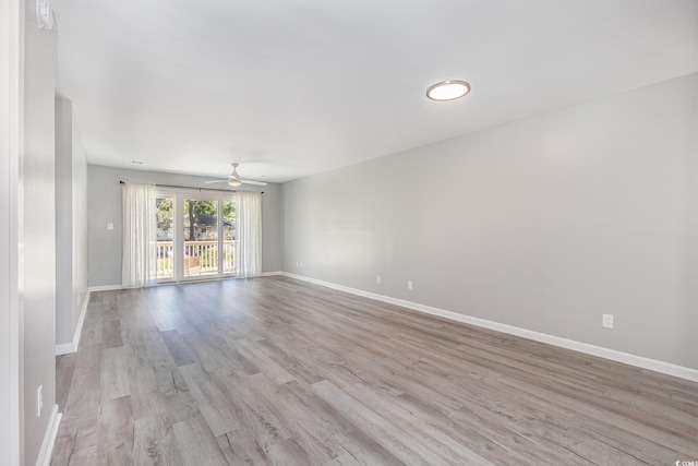 3015 Old Bryan Dr Unit 10-7, Myrtle Beach, SC 29577 - empty room featuring baseboards, light wood-type flooring, and a ceiling fan