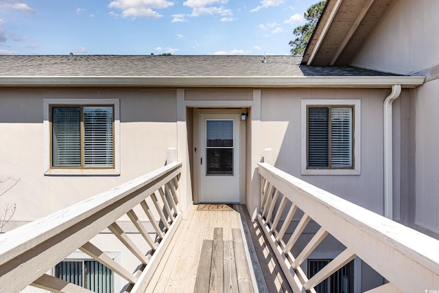 3015 Old Bryan Dr Unit 10-7, Myrtle Beach, SC 29577 - view of exterior entry featuring a wooden deck and a shingled roof